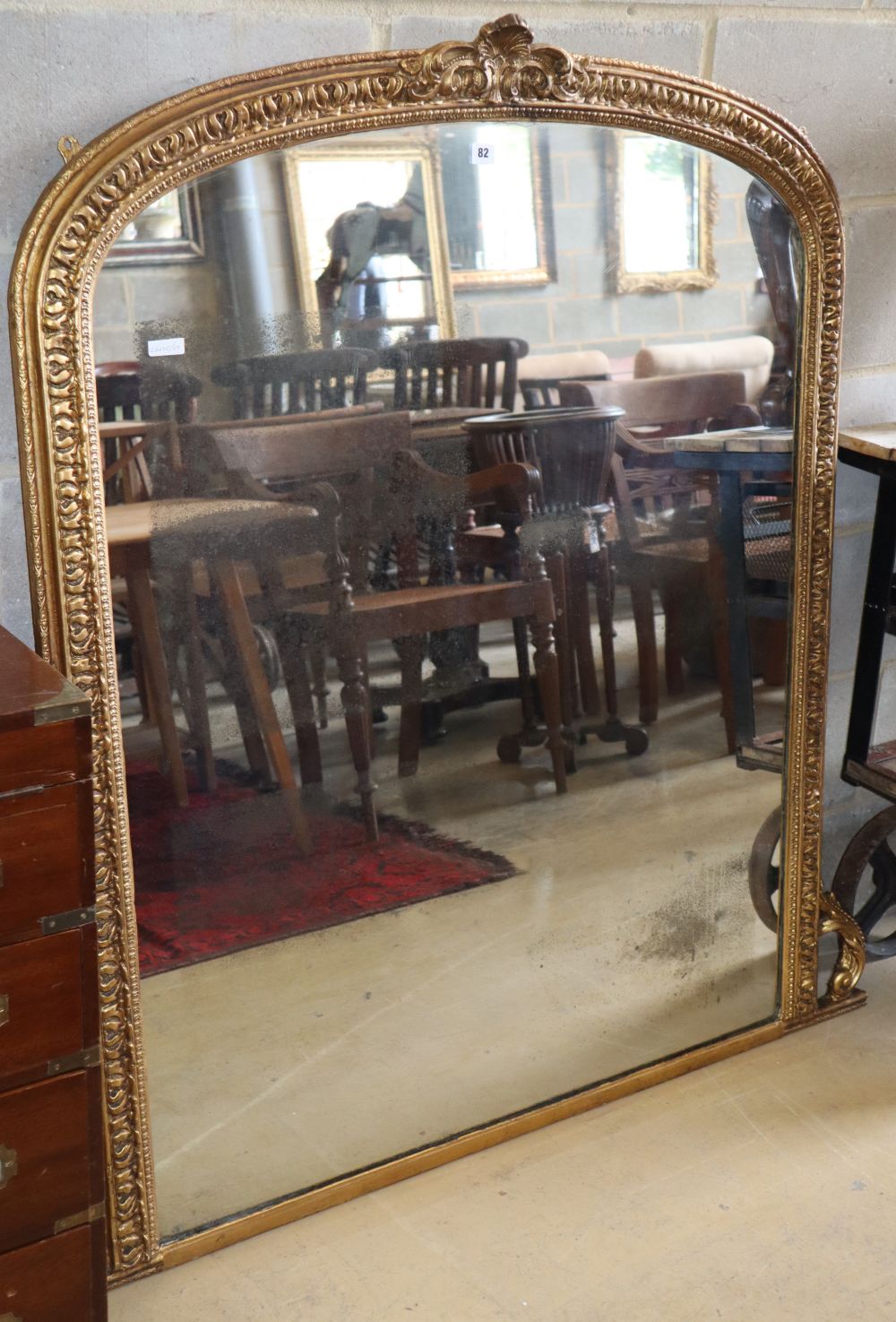 A Victorian giltwood and gesso overmantel mirror, W.130cm, H.136cm